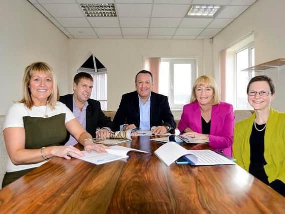 The NGT board, from left, Sian Belfield, Customer Relations Director; Dave Finch, Financial Director; David Craven, Non-Executive Chairman; Deborah