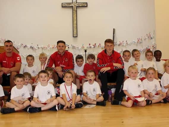 Fleetwood Town FC stars meet pupils at Sacred Heart Primary School