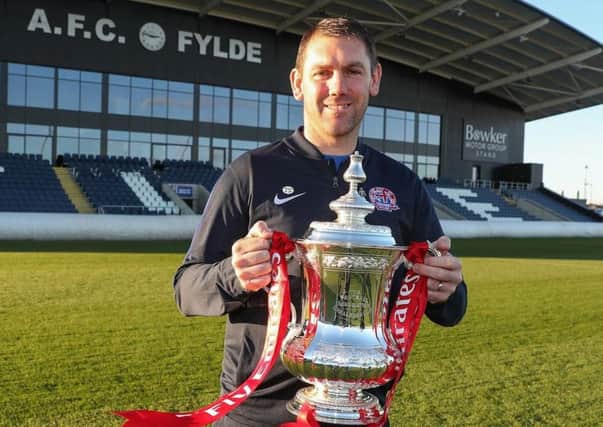 Fylde boss Dave Challinor with the FA Cup ahead of last seasons second-round tie against Wigan
