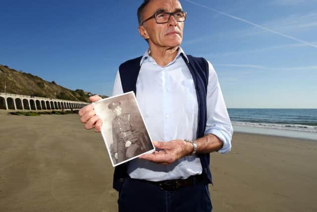 Filmmaker Danny Boyle holds a photograph of Private Walter Bleakley, who was from the same street where Danny went to school, as he announces plans for his Armistice Day commission for 14-18. Photo credit: Gareth Fuller/PA Wire