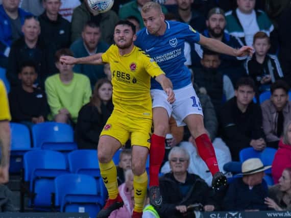 Lewie Coyle challenges in the air at Portsmouth