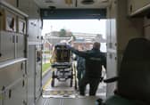 A shopper who collapsed in Home Bargains being helped into A&E at Blackpool Victoria Hospital