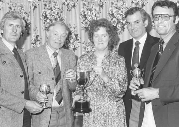 Fleetwood and Cleveleys Lion Club won the team prize at the Portmadoc Lions' Club's Open golf championship at Portmadoc Golf Club, in 1980 with AF Simmons being runner-up in the individual championship after a card play-off to D Pounds. The pictures shows - from left: JC Wilson, D Pounds, Mrs Glynn Jones, Mr Glynn Jones (president Portmadoc Lions), AF Simmons