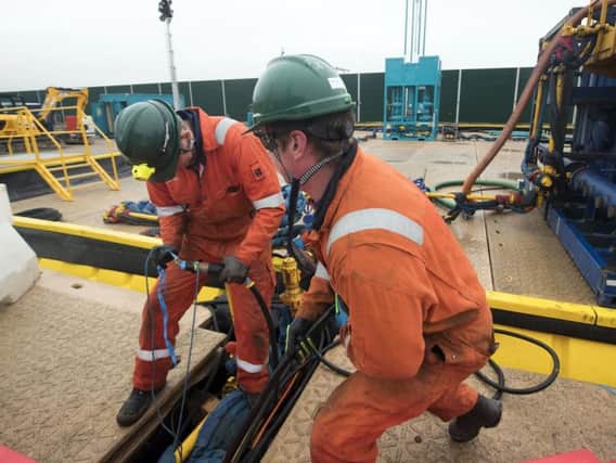 Workers at the Cuadrilla fracking site in Preston New Road, Little Plumpton, Lancashire