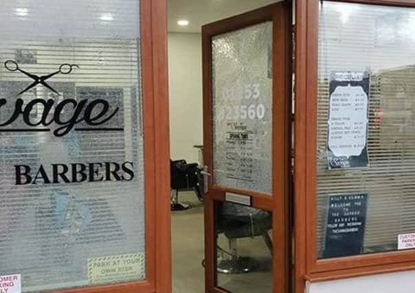 Damage to The Savage Barbershop