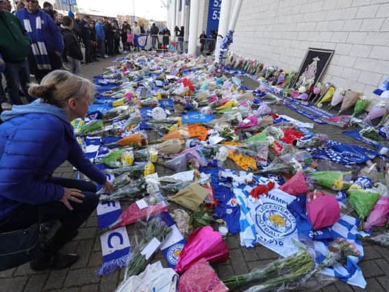 Supporters have been paying tribute outside Leicester's King Power stadium