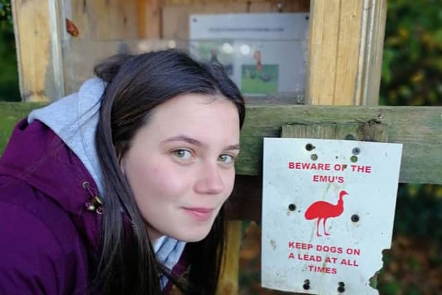 Abby Clarke took off when a group of emus ran towards her on a public footpath.