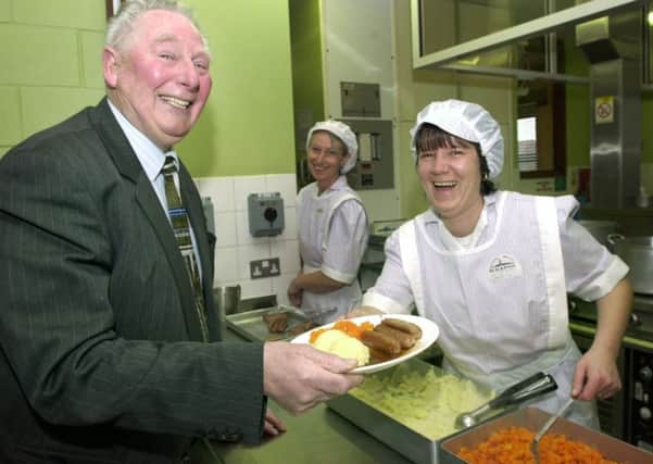 Blackpool councillors enjoyed a school lunch at Layton Primary School in 2001. Henry Mitchell is served sausage and mash by Helen Watson,
