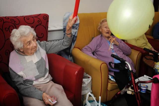 Edith and June take part in the balloon exercises
