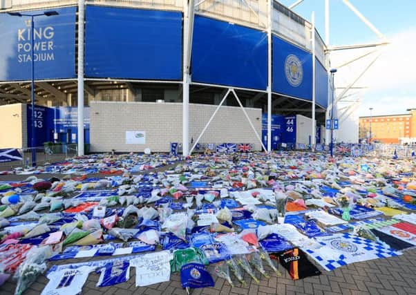 The moving tributes on display outside Leicester Citys King Power Stadium