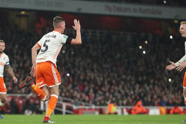 Paudie O'Connor celebrates after pulling a goal back for Blackpool