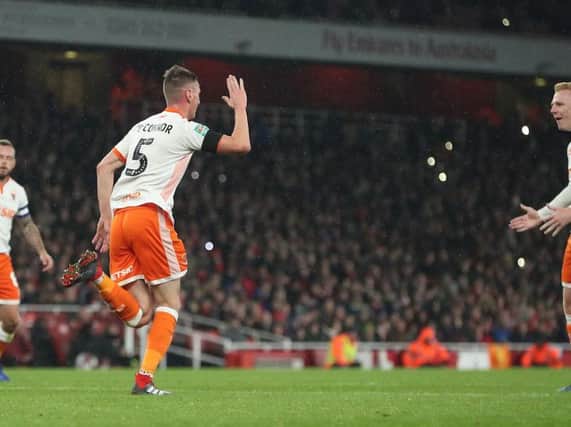 Paudie O'Connor celebrates after pulling a goal back for Blackpool