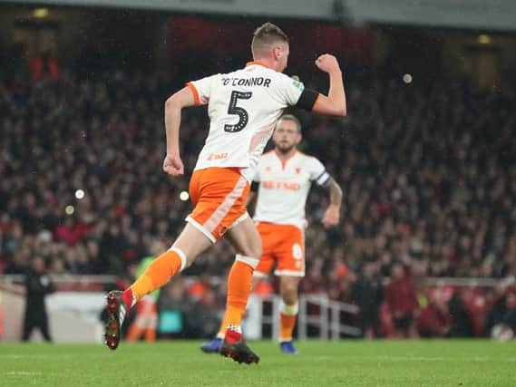 Paudie O'Connor celebrates after pulling a goal back for Blackpool at the Emirates