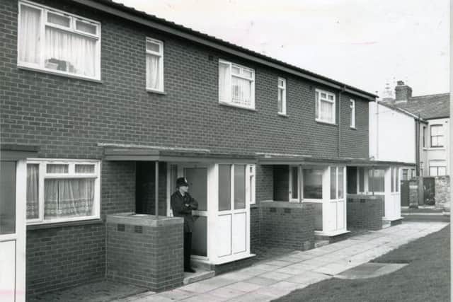 A policeman stands guard outside the home in Langfield Avenue, South Shore of window cleaner John Johnstone who found the body.