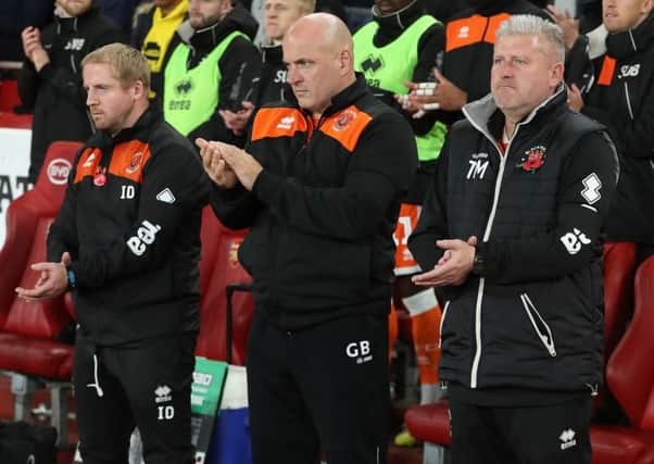 Blackpool boss Terry McPhillips and everyone at Bloomfield Road are focusing on league matters after their midweek Arsenal trip