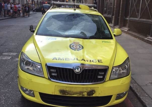 Undated handout file photo issued by the London Ambulance Service of an emergency response vehicle that was damaged on Borough High Street, London during post match celebrations after the England football team qualified for the semi-final of the World Cup..