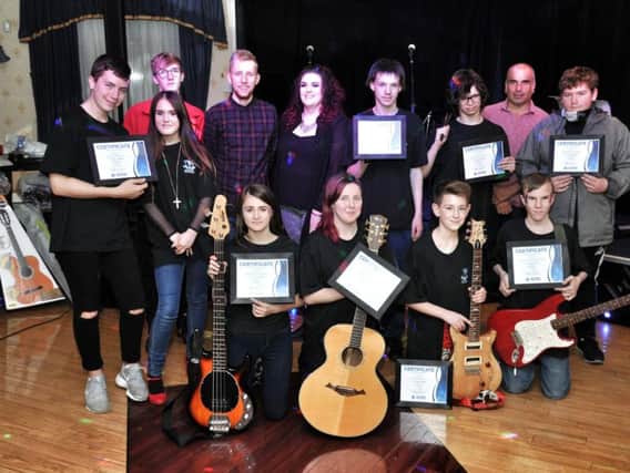 Members of Blackpool Music School with their certificates