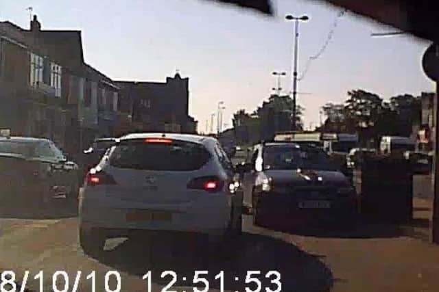 Dashcam footage of the incident in Layton shows the car heading the wrong way down the road, narrowly missing oncoming traffic