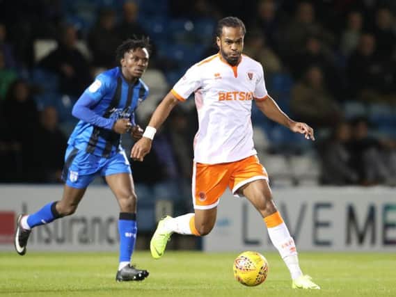 Nathan Delfouneso was pleased to help Blackpool grind out a win