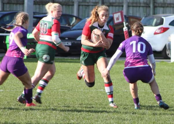 Laura Perrin (on the ball right) developed her passion for rugby union with Fylde Mini-Juniors