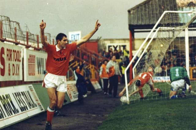 Dave Bamber celebrates yet another goal in a Seasiders shirt