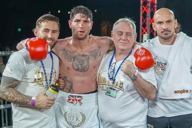 Brian Rose celebrates with his team after his victory in Manchester on Friday night. Picture: Chris Roberts for MTK Global