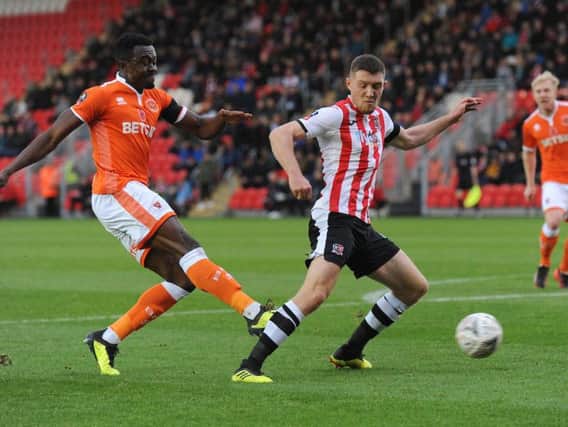 Joe Dodoo bagged a goal and an assist in Pool's FA Cup first round win at Exeter yesterday