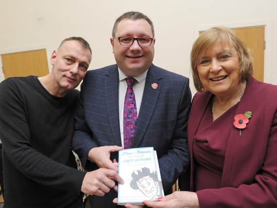Mike Bartram, who compiled the book, with Grand Theatre house manager Shaun Gorringe and Lady Anne Dodd