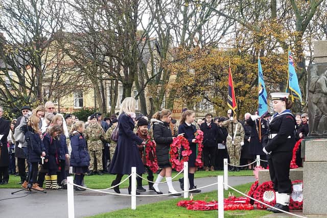 Local children laid poppies to honour the fallen solidiers.