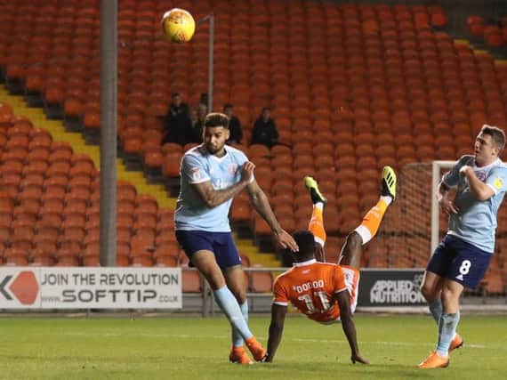Joe Dodoo levelled the scoring for Blackpool last night with a spectacular overhead kick