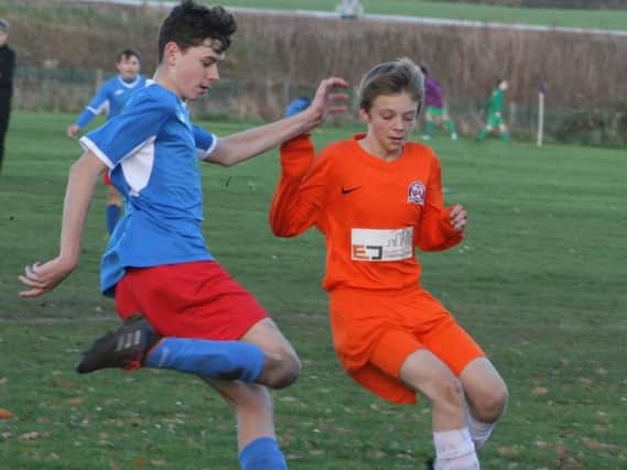 Under-15 action from Kirkham Juniors Reds v AFC Blackpool
