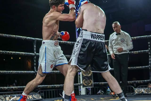 Brian Rose on the offensive against Alistair Warren on his return to the ring. Picture: Chris Roberts for MTK Global