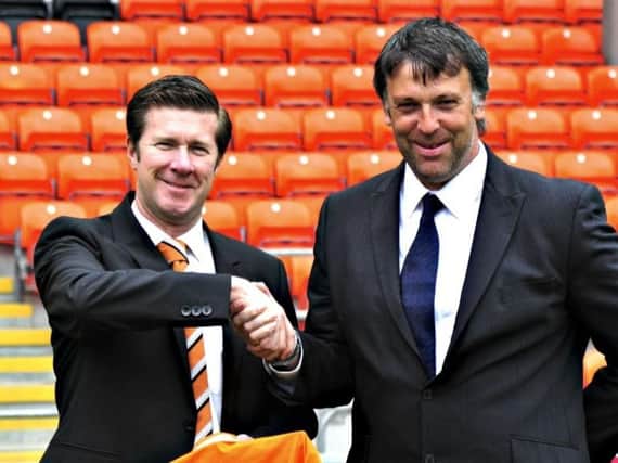 Paul Rowley shakes hands with former club chairman Karl Oyston at the launch of Rowleys
