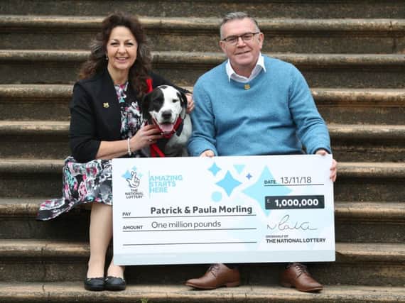 Patrick Morling, 60, and his wife Paula, 54, from Havant, Hampshire, during a photo call at the Queens Hotel in Southsea, Hampshire after they won 1 million on a National Lottery scratchcard. Photo credit: Andrew Matthews/PA Wire