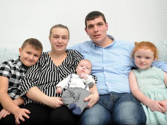 Parents Natasha and Robert Davies with their 10-week-old baby Michael                                                            Davies and his brother and sister Callum, 11 and five-year-old Hayleigh.