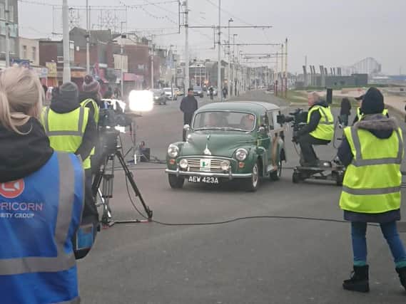 Coronation Street star Roy Cropper (David Neilson) filming on Blackpool Promenade