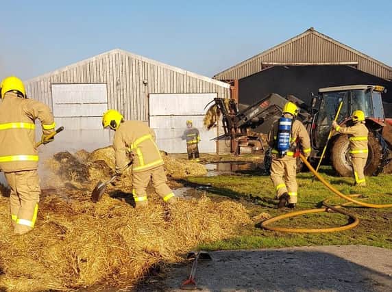Firefighters tackling the barn fire