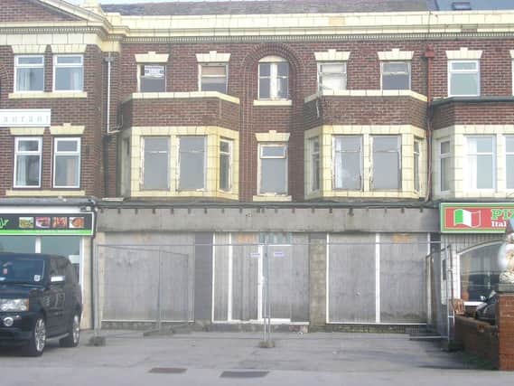 A boarded up former Blackpool hotel