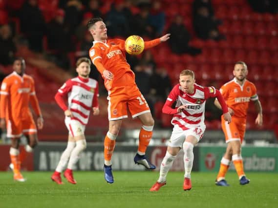 Jordan Thompson in action for Blackpool at the Keepmoat last night