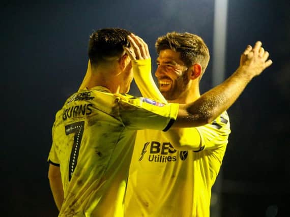 Wes Burns and Ched Evans celebrate