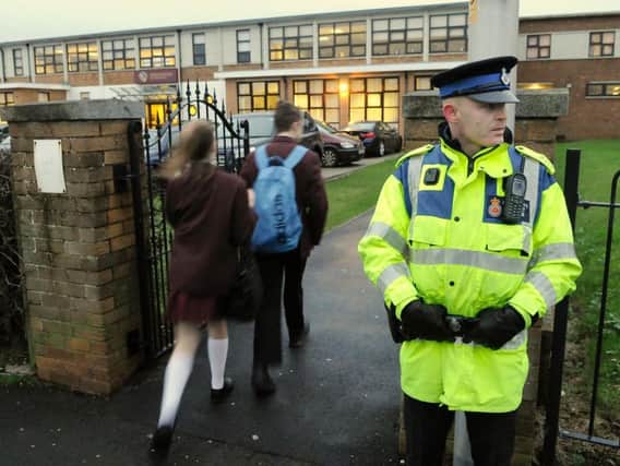 Police presence at Montgomery High School as pupils arrive for school following online threats on Facebook in 2016