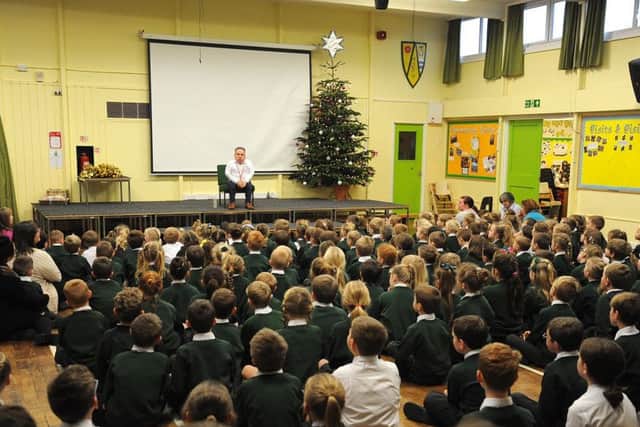 Actor Warwick Davis pays a visit to Strike Lane Primary School in Freckleton