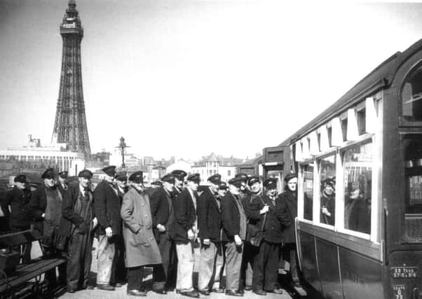 Rail workers boarding a train at Blackpool Central Station.