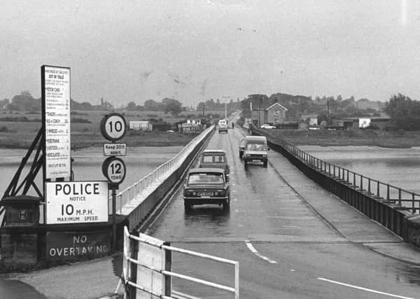 Cars going over Shard Bridge, in 1980