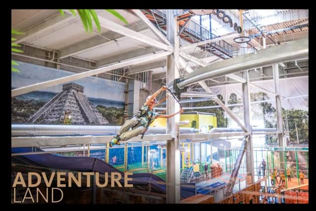Expansive indoor family entertainment centre incorporating a series of physical and mental challenges including free-fall hang gliding, rope courses, adventure trails and  interactive climbing walls