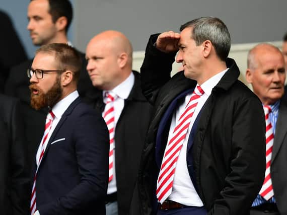 Fleetwood Town's technical director Gretar Steinsson, left, and Fleetwood Town chairman Andy Pilley, right