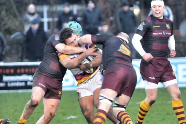 Hard-hitting action from Fylde v Huddersfield