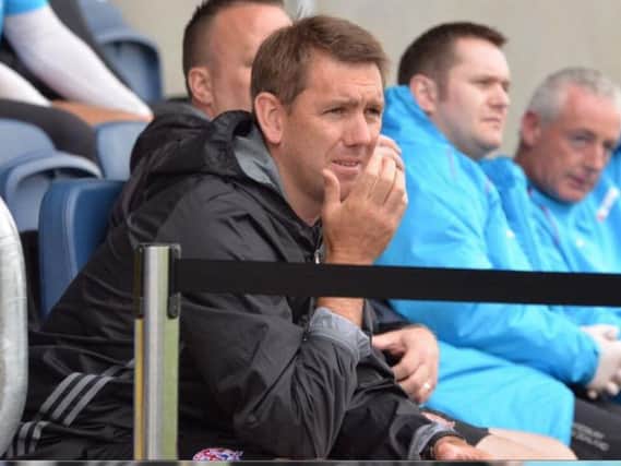 Dave Challinor was furious to see his Fylde side concede two late goals
