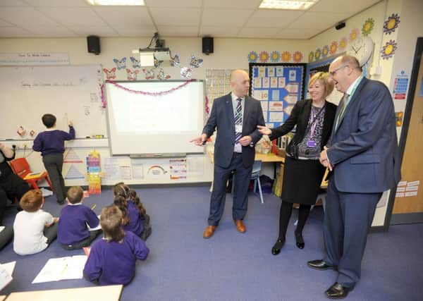 NAHT president Andy Mellor (L) and general secretary Paul Whiteman (R) pay a visit to Boundary Primary School to congratulate them on their recent TES award nomination for School of the Year. They are pictured with headteacher Suzanne Ashton.