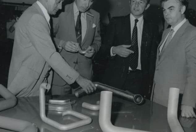 Industry minister Norman Lamont (right), visited British Aerospace, Warton Division, in 1983. Mr Lamont, accompanied by Preston MP Robert Atkins (second left) toured both the Warton and Preston factories